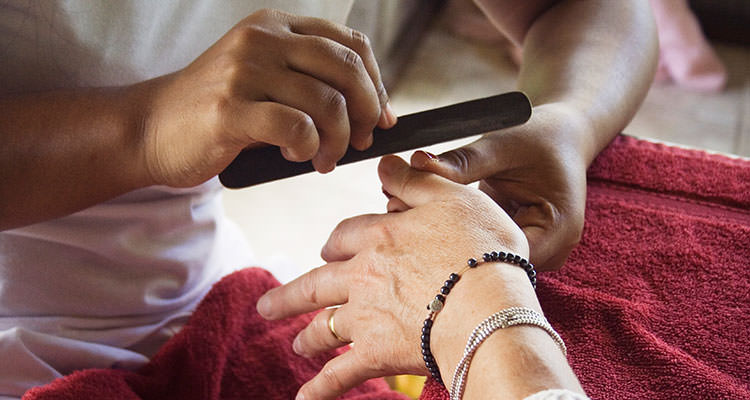 Professional manicure performed in the spa of the Ubud yoga retreat centre of Oneworld Retreats.